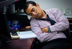 493ss_getty_rf_man_sleeping_at_work