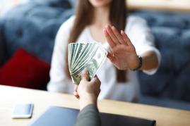 lady-s-hand-showing-stop-sign-business-woman-refusing-money-anti-bribery-corruption