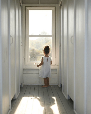 watching out a window little girl.png